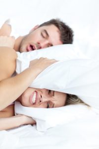 man snoring wife frustrated